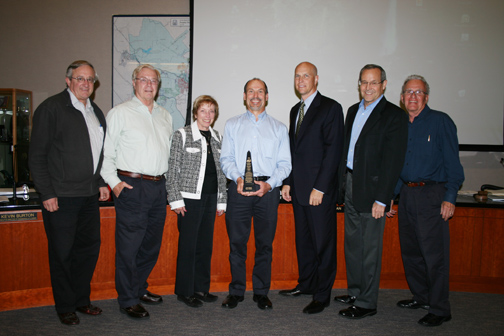 Pictured from left - Board members John Withers, Peer Swan; Board President Mary Aileen Matheis; Director of Administrative Services Tony Mossbarger; General Manager Paul Cook, and Board members Steve LaMar and Doug Reinhart.